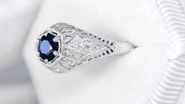 Edwardian Sapphire and Diamonds Scroll Dome Filigree Engagement Ring in Platinum